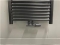 Thermrad Tone design onderblok 1/2" mat zwart met thermostaatknop, koppeling 16x2 en 15mm, rozet en afdekking tbv middenaansluiting.